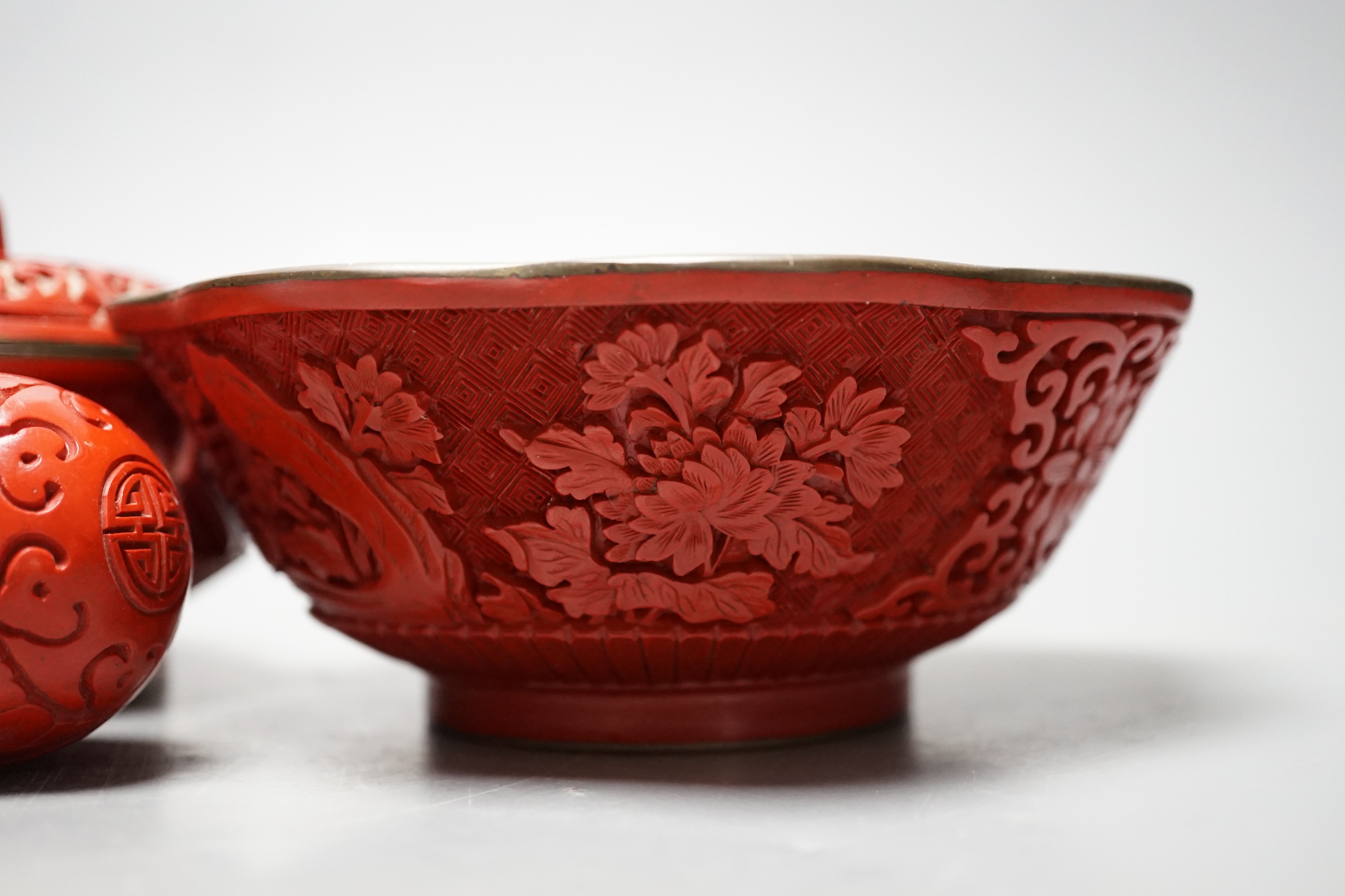 A Chinese cinnabar lacquer bowl, 15cm a similar covered box and egg, and a carved circular box and cover